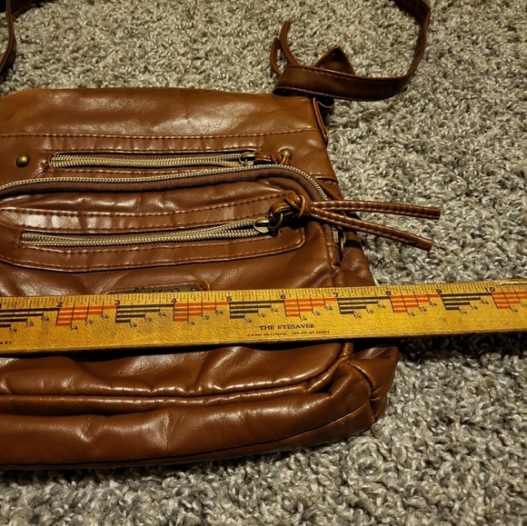 Stone & CO smoking mountain bucket cross body in the color Cognac - Picture 12 of 14